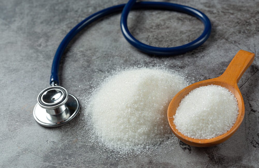 world-diabetes-day-sugar-wooden-bowl-stethoscope-dark-background