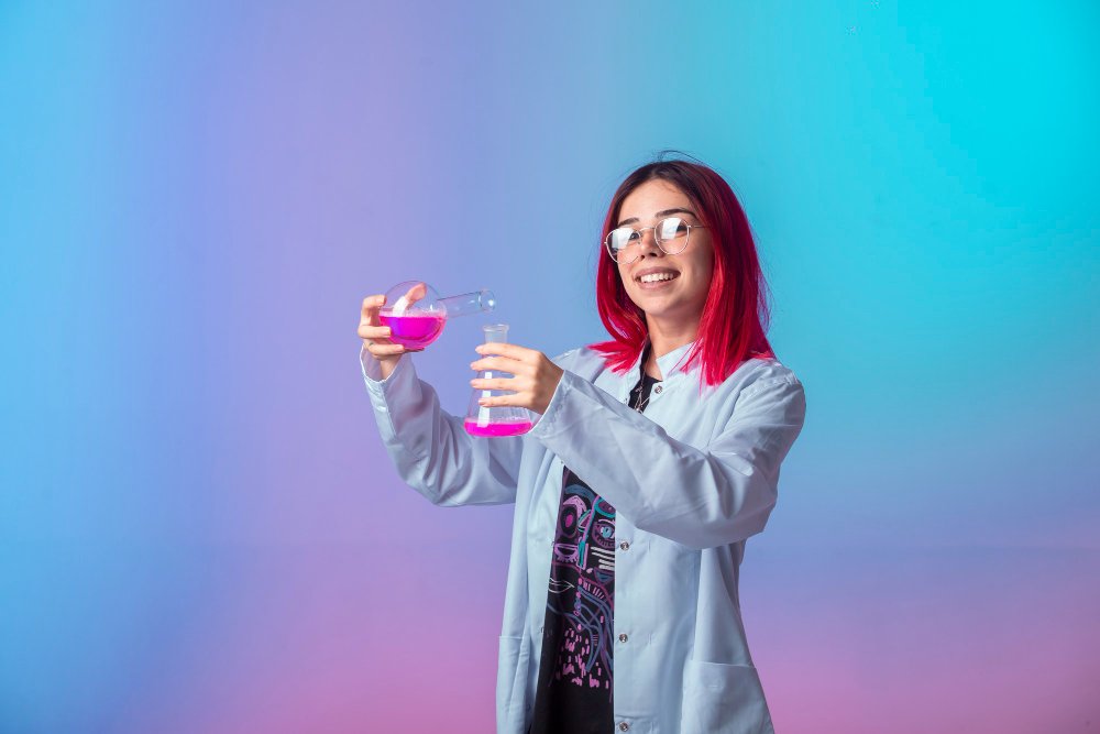 young-girl-with-pink-hairs-holding-chemical-flasks-making-reaction